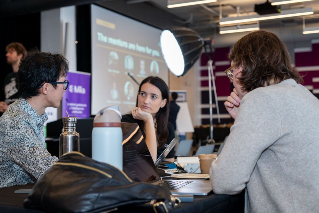 Sophie Lemieux working with a team at a build event